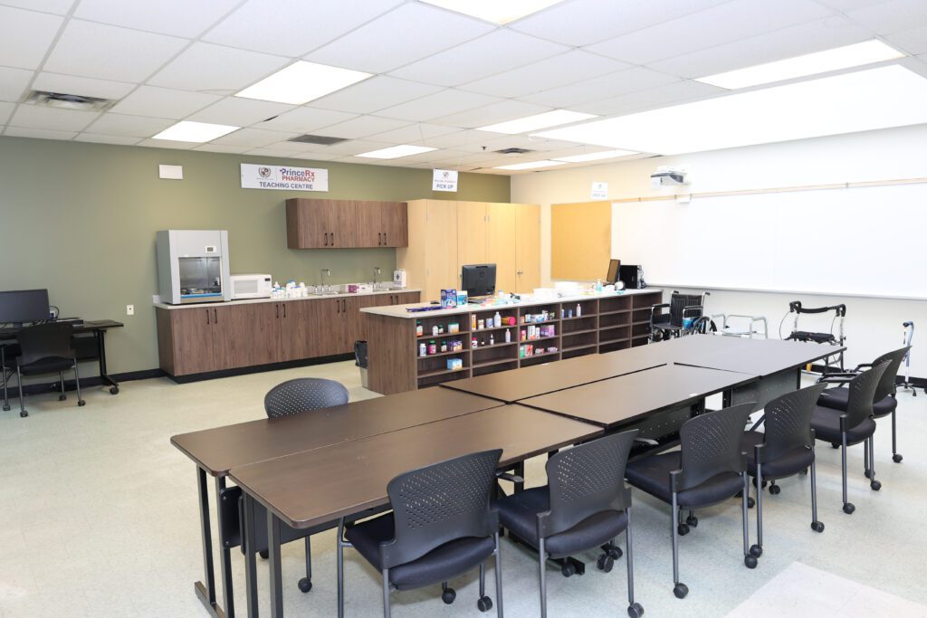 A teaching lab with work tables and cabinets